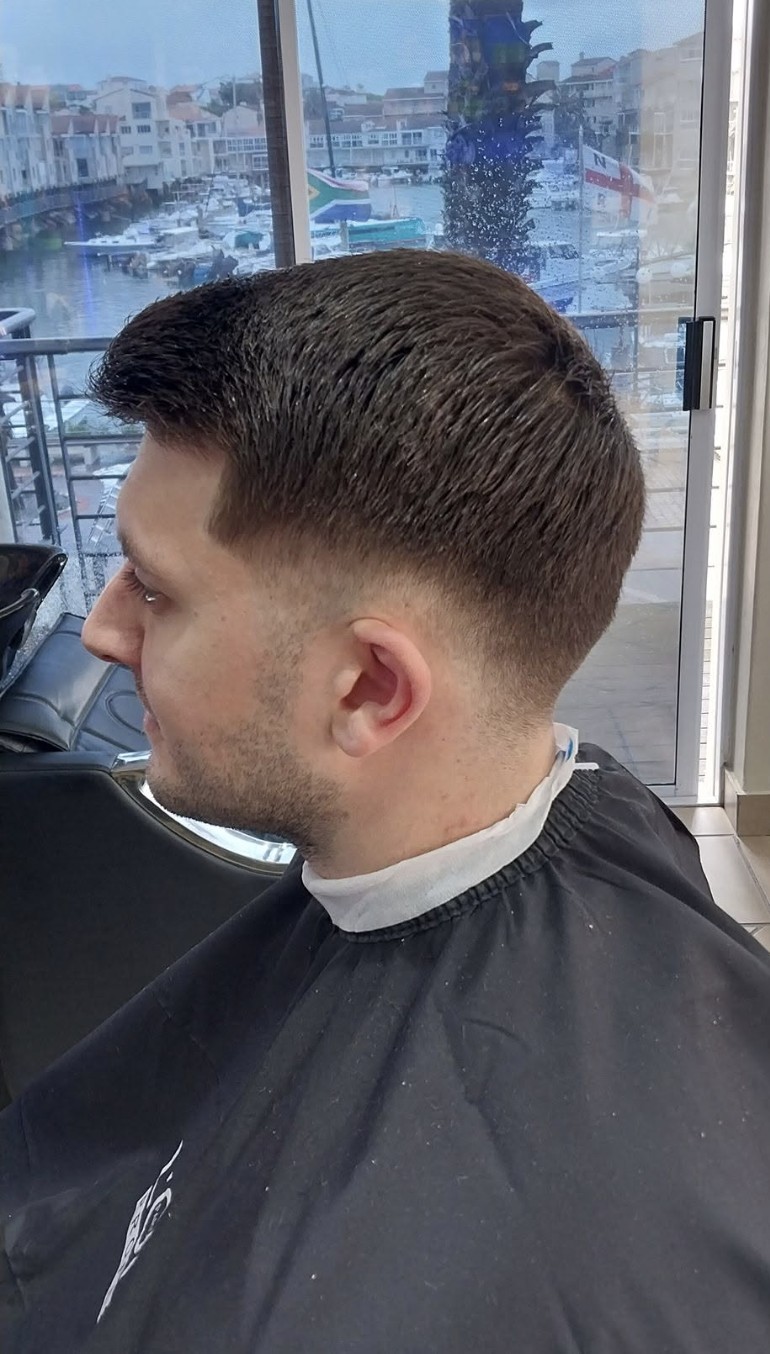 Short back and sides with a taper fade — recent haircut at Bay Barber.
